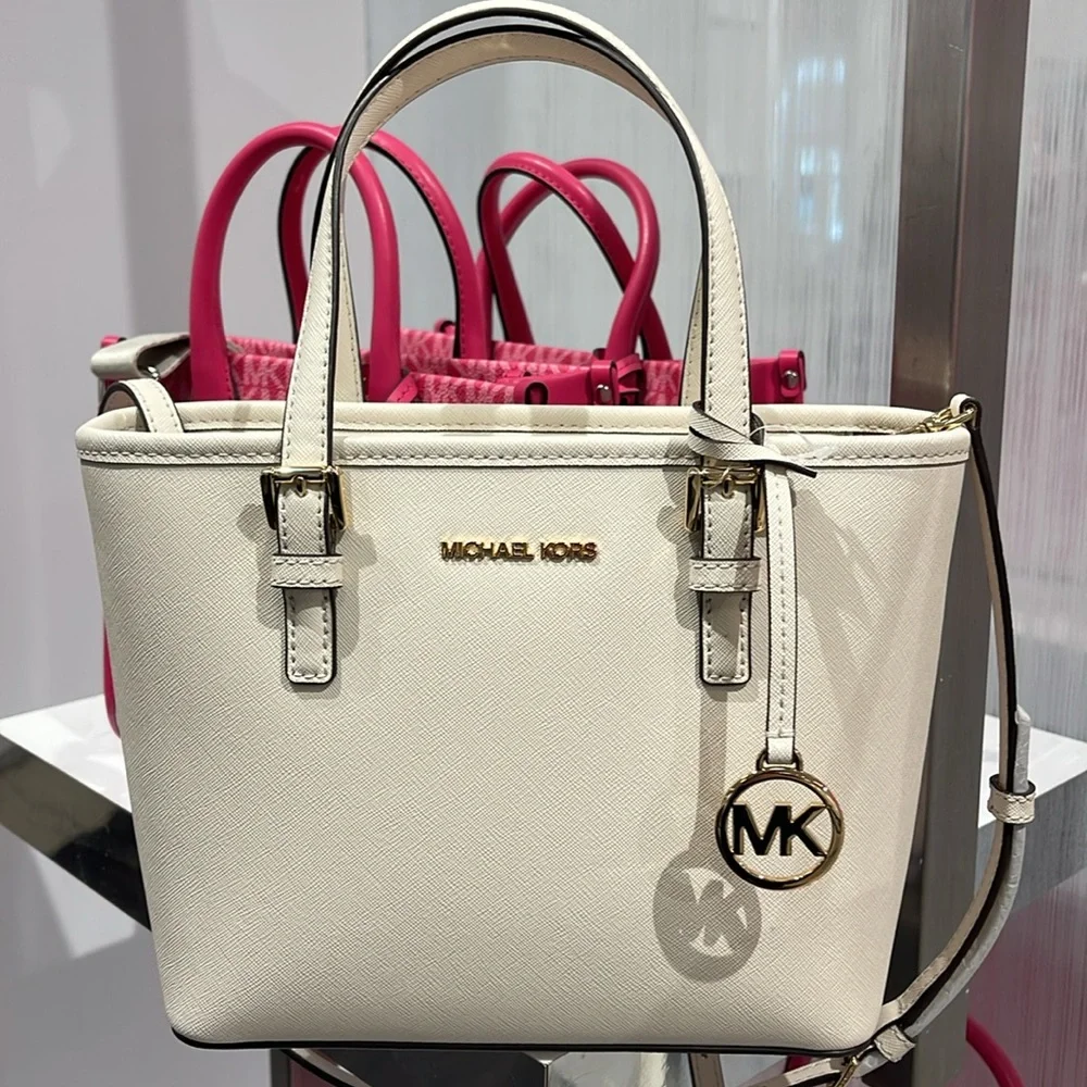 Michael Kors Jet Set Travel Extra-Small Top-Zip Tote Carryall Bag
Light Cream - Picture 14 of 16